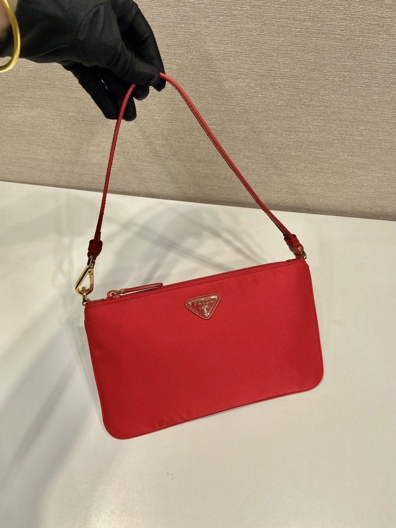 Pra*a clutch bags